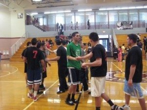 The Greater Boston ‘Nejdeh’ and Philadelphia ‘Sebouh’ men’s basketball teams shake hands following their final match.