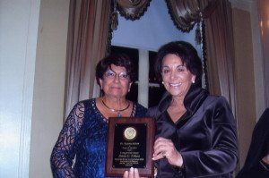 U.S. Congresswoman Anna Eshoo, right, receives a plaque from Angele Manoogian. 