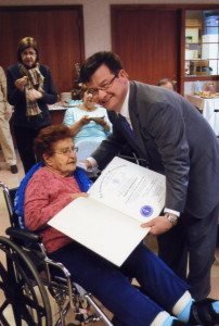 Massachusetts State Rep. Brian Dempsey presents a citation to Jennie Vartabedian as the last remaining survivor of the Armenian Genocide in Haverhill.