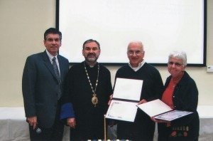 John and Violet Dagdigian are honored with distinguished service awards from the Armenian Prelacy during a 39th anniversary celebration of St. Gregory Church of North Andover. They are joined here by Bishop Anoushavan Tanielian, vicar general, and John Kulungian, chairman, Board of Trustees. 
