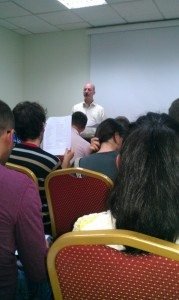 Observer mission organizer Kirk Wallace leads a team training of English-speaking monitors in Yerevan.