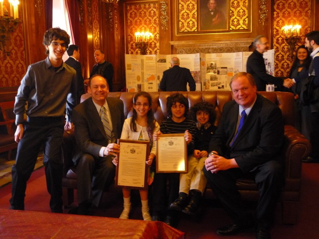 Rep. Jeff Stone (R-Greendale), second from left, and Rep. Tyler August (R-Lake Geneva), far right, with (L-R) future ANC-WI activists Arakel Khaligian, Alidz Khaligian, Luc Dadian, and Leo Dadian holding State Assembly and Senate Armenian Genocide resolutions.