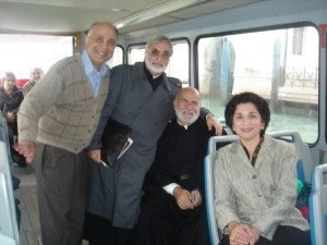 Shirley and Levon Saryan with Fr. Yeghishe Joulian and Fr. Krikor Mikaelian in the water taxi to San Lazzaro (File photo)