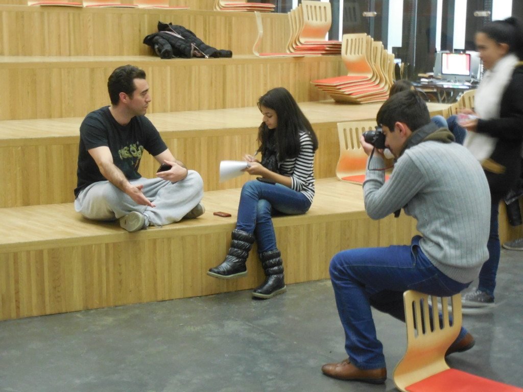 TUMO News reporter, Lusineh Torossyan and photographer Gor Mkhitaryan interviewing Serouj Aprahamian before his breakdancing workshop.