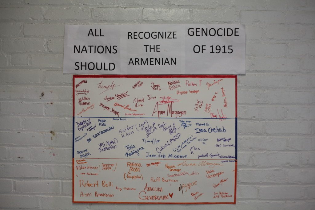 A poster, signed by dozens of students, urges "all nations" to recognize the Armenian Genocide.