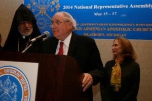 United States Senator Carl Levin graciously accepts the Prelacy’s “Spirit of Armenia” Award with his wife and Archbishop Oshagan Choloyan looking on.