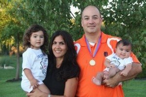 Olympic King Alex Sarafian with wife Kara and 2 children, Ani, 27 months, and Alina, 4 months