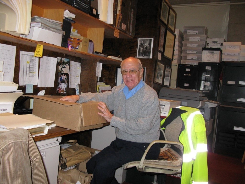 The ultimate volunteer John Kebadjian is hard at work inside Project SAVE Archives in Watertown, where he has spent the past five years donating almost 8,000 hours of service. (Photo by Ruth Thomasian)