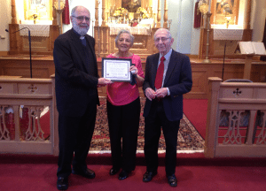 Certificate of appreciation recipients Mr. and Mrs. Joseph  and Florence Markarian with Fr. Antranig. 