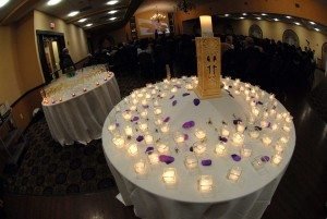 The table with 100 lit candles