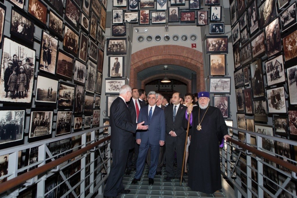Arthur Berger, Senior Advisor to the United States Holocaust Memorial Museum, leads Armenian President Serge Sarkisian; His Holiness Karekin II, Supreme Patriarch and Catholicos of All Armenians; the Armenian Foreign Minister and Minister of Diaspora Affairs; Archbishop Khajag Barsamian, the Primate of the Eastern Diocese; and others viewing the Tower of Faces exhibit (Photo: U.S. Holocaust Memorial Museum)