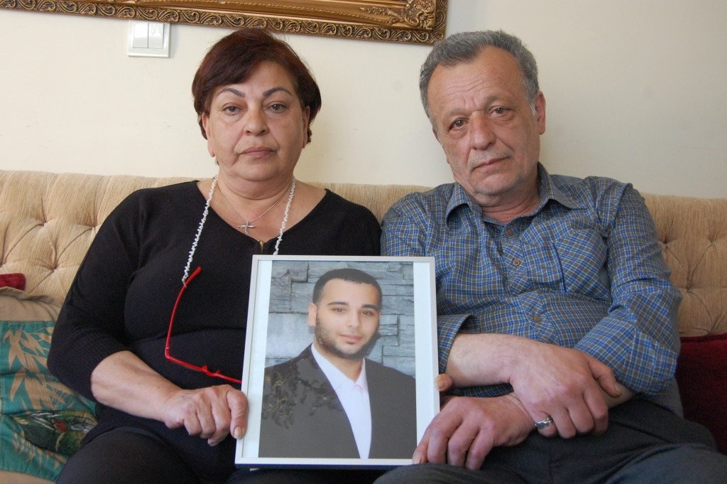 Ani and Garabet Balıkçı hold a photograph of their son Sevag (Photo: Elsa Landard)