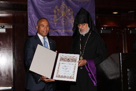  Archbishop Oshagan Choloyan presents the Spirit of Armenia Award to the honorable Deval Patrick, former governor of Massachusetts, for his unwavering support of the Armenian community and, especially, the Armenian Genocide Memorial at the Rose Kennedy Greenway in Boston. (Photo: Albert Der Parseghian)
