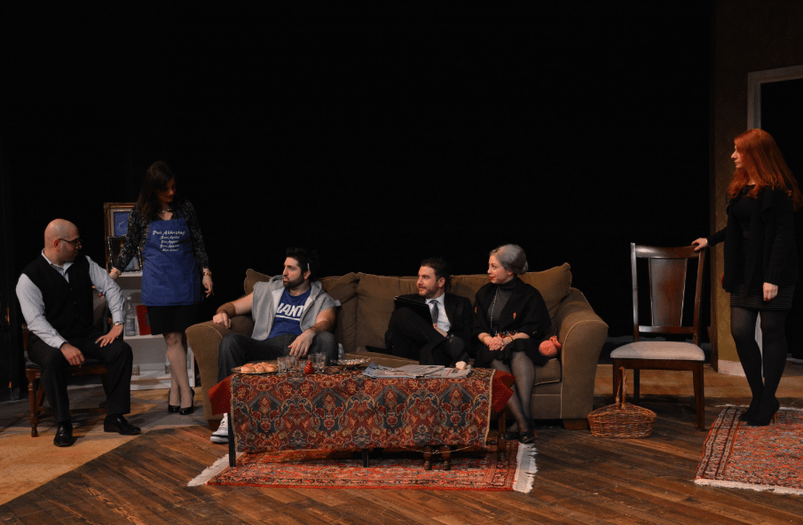 A scene from ‘Where Is Your Groom? (Pesad Oor Eh)’ featuring (L-R) patriarch Koko Keshishian (played by Aris Hamparsumian), matriarch Siroun (played by Daniella Baydar), Mike the ‘odar’ (played by Joseph Hovsepian), brother Saro (played by Haig Minassian), Medz Mayrig (played by Lori Cinar), and daughter Lara (played by Taleen Babayan)(Photo: Jon Blankenberg)