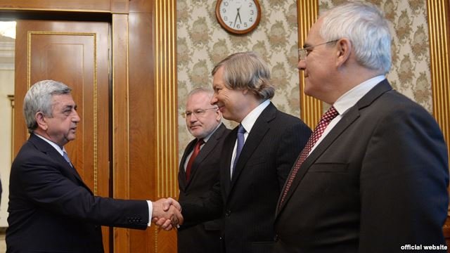 President Serge Sarkisian greets OSCE Minsk group co-chairs in Yerevan on July 20.