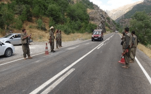 PKK fighters can be seen controlling road traffic and searching vehicles in a video released by Rudaw