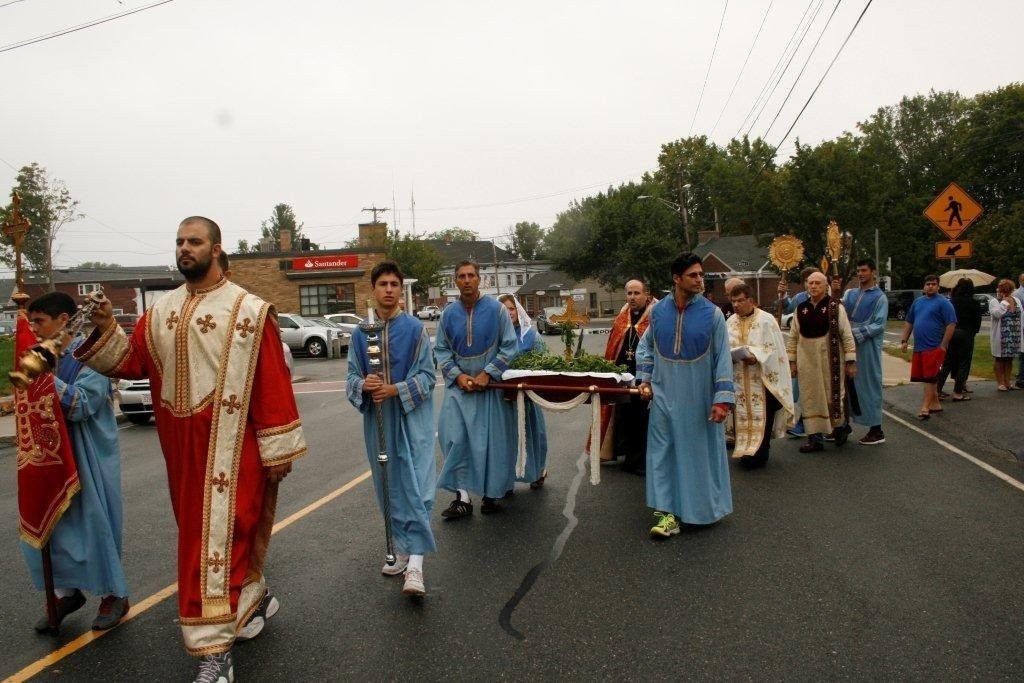 Stole-bearer Mgo Kassabian leads a religious procession at St. Gregory Church a week after leading his North Andover AYF to Most Improved Chapter recognition. Mgo also received the coveted Ernest Nahigian Sportsmanship Award for exemplary service at the Games. (Photo: Tom Vartabedian)