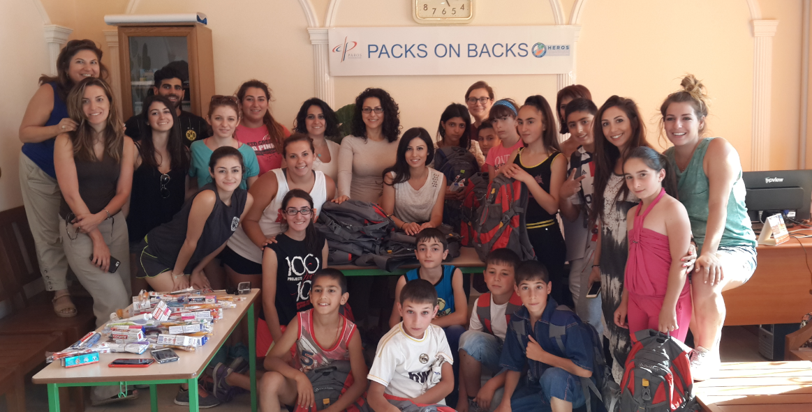 Children and volunteers at the Debi Arach Children’s Center in Gyumri during the ‘Packs on Backs’ distribution. 