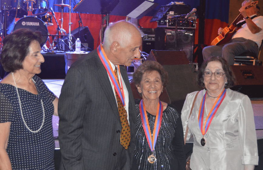  (L-R) Anahid Varadian and Garry Giragosian receiving the Spirit Award for Penny, Maro Kachadourian, and Sylvia Varadian.