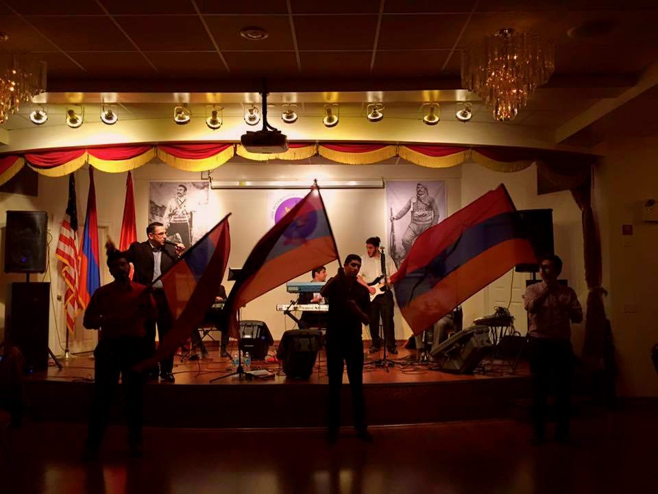 New York ‘Hyortik’ AYF Chapter members waving the flag to Armenian patriotic songs performed by the Artsakh Band of Philadelphia