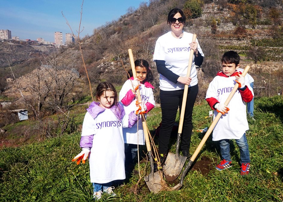 ATP Executive Director Jeanmarie Papelian with a couple of young volunteers planting trees with ‘Synopsys’ at the Yerevan Zoo