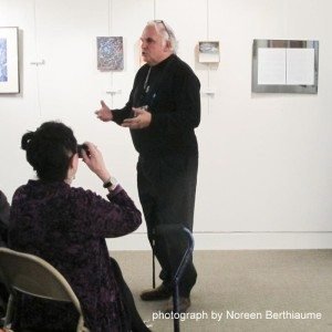 Barry Martasian giving a talk at his painting exhibit ‘Full Circle’ at the Armenian Museum of America
