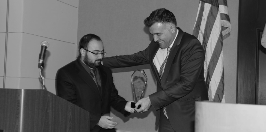 Tekir accepting the ANCA-ER Activism Award on behalf of the Nor Zartonk Movement