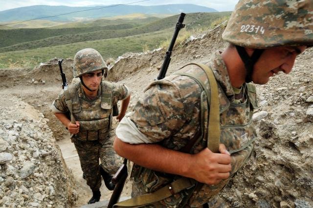Armenian soldiers patrol near the border with Azerbaijan in 2012. (Photo: AFP/Karen Minasyan) 