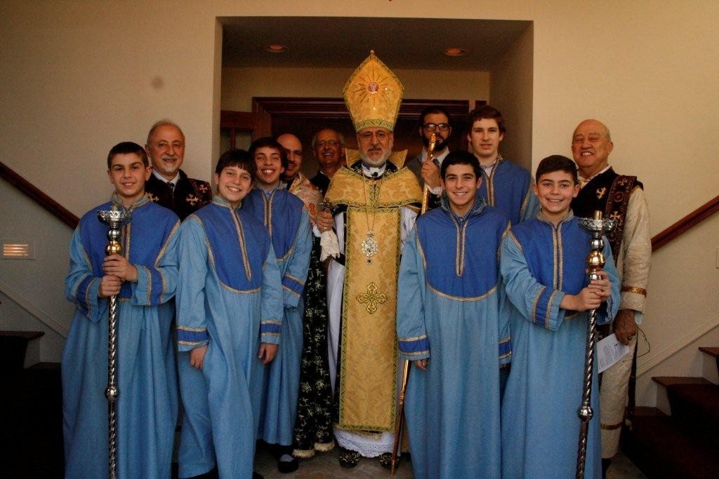 Archbishop Oshagan Choloyan is joined by a full cast at St. Gregory Church in North Andover where he ordained four boys as acolytes. (Front row) Richard Shahtanian, Robert Mahlebjian, James Kochakian, and Alexander Movsessian. (Photo: Tom Vartabedian)