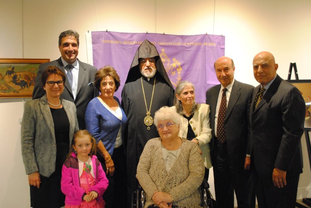 Archbishop Oshagan Choloyan with the Garabedian family (Photo: Tamar Kanarian) 
