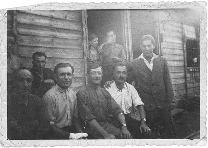The Armenian section of the Klagenfurt DP camp. My mother and father standing behind the group of Armenian men.