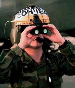 Binocular night vision goggles on a flight helmet (Photo: Spc. Gary A. Bryant)