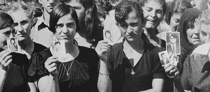 Cypriots hold up photos of missing family members following Turkey’s 1974 invasion. More than 5,000 Cypriots were killed while hundreds of thousands of refugees were ethnically cleansed and forced into concentration camps. Excavations and DNA testing continue to this day to locate the thousands that are missing and to bring closure to their families.