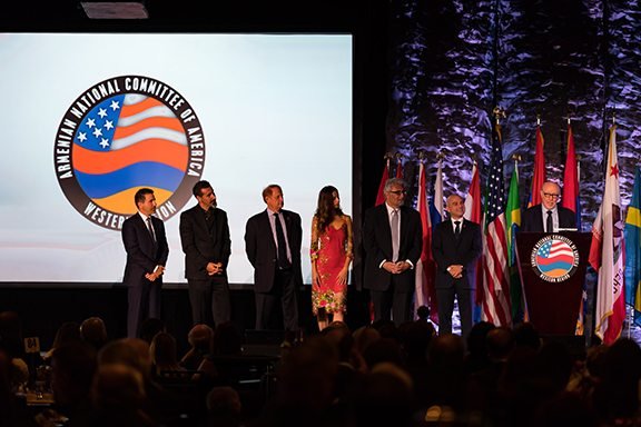 Academy Award-winning Director Terry George giving his remarks about Armenian Genocide film “The Promise,” joined on stage by producer Mike Medavoy, actress Angela Sarafyan, musician Serj Tankian, and producer Kevin Matossian, Producer Eric Esrailian and ANCA-WR Board Member Steve Artinian