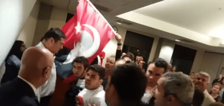 Armenian students who peacefully protested a genocide denier’s lecture celebrating Mustafa Kemal Ataturk’s career at Chapman University on Nov. 10 were attacked as the audience punched, shoved, spit, and yelled fascist hate speech at them. (Photo: AYF video screenshot)