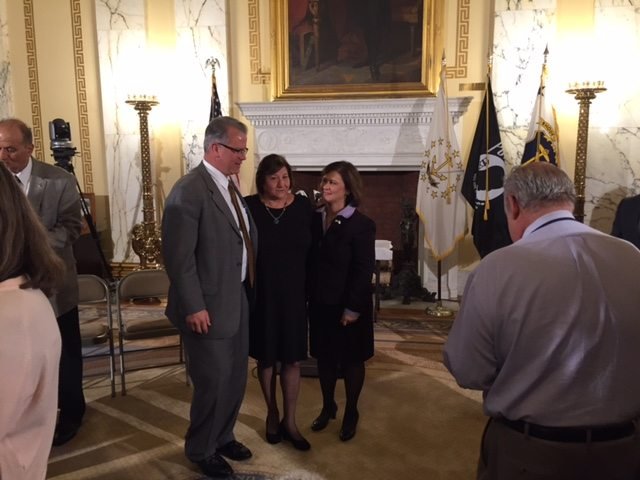 Haroian with Speaker of the House Nicholas Mattiello and Secretary of State Nellie Gorbea.