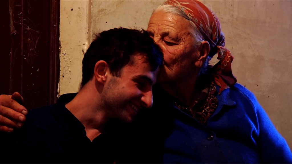 Davit Grigoryan and his grandmother (Photo: The Armenian Weekly)